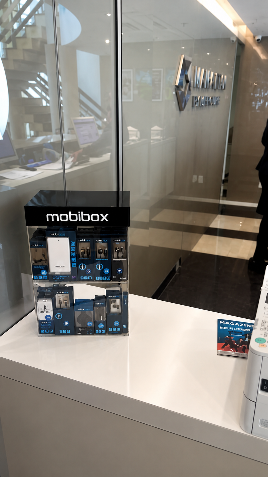 Mobibox display on a hotel front-desk countertop
